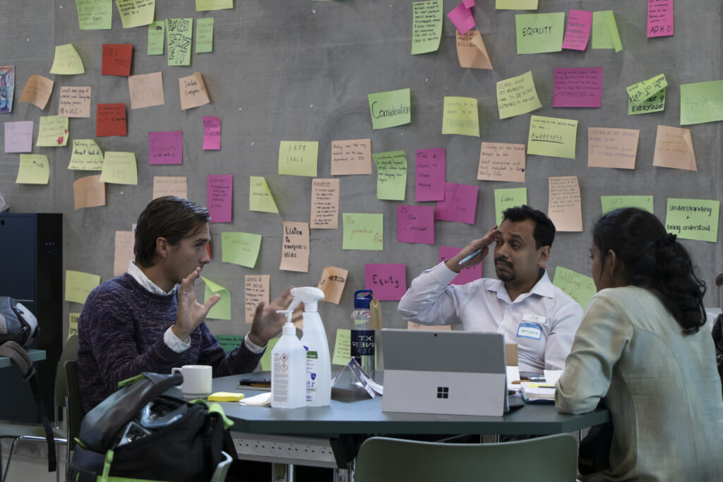 A startup team having a mentor session with a business developer at DTU Skylab